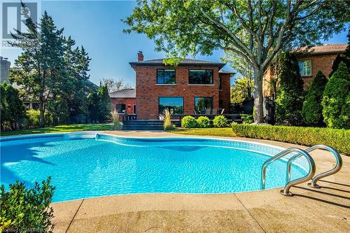 1319 Greeneagle Drive, Oakville, ON - Outdoor With In Ground Pool