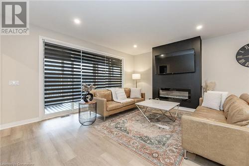 300 Richmond Street Unit# 22, Thorold, ON - Indoor Photo Showing Living Room With Fireplace