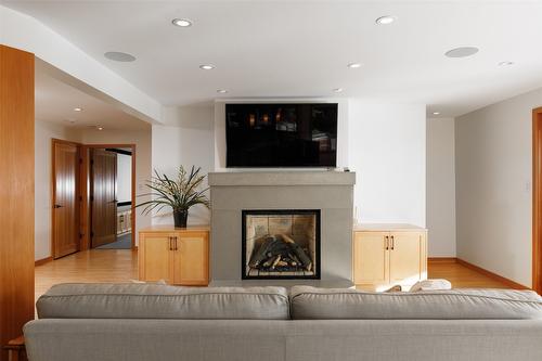 8100, 8104 Silver Star Road, Vernon, BC - Indoor Photo Showing Living Room With Fireplace