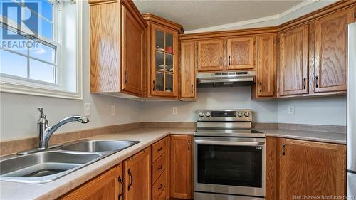 166 Ulysse Drive, Dieppe, NB - Indoor Photo Showing Kitchen With Double Sink