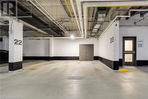 View of garage - 15 Prince Albert Boulevard Unit# 610, Kitchener, ON - Indoor Photo Showing Garage