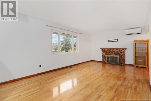 55 Leeside Drive, Moncton, NB - Indoor Photo Showing Living Room With Fireplace