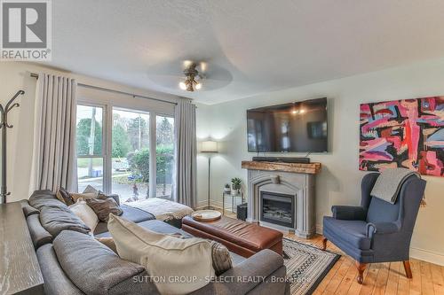 210 Ridgewood Crescent, London, ON - Indoor Photo Showing Living Room With Fireplace