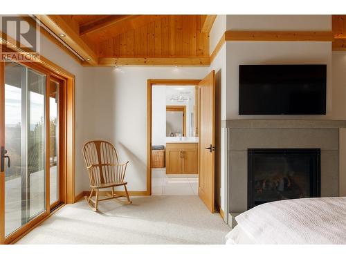 8100, 8104 Silver Star Road, Vernon, BC - Indoor Photo Showing Other Room With Fireplace