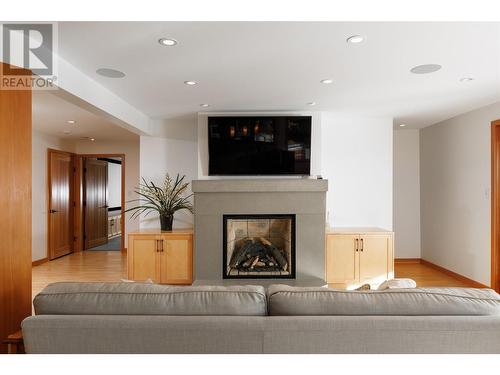 8100, 8104 Silver Star Road, Vernon, BC - Indoor Photo Showing Living Room With Fireplace