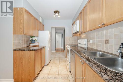 1009 - 714 The West Mall W, Toronto, ON - Indoor Photo Showing Kitchen With Double Sink