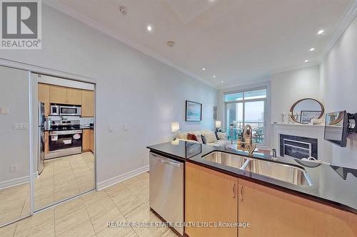 3108 - 4080 Living Arts Drive S, Mississauga, ON - Indoor Photo Showing Kitchen With Fireplace With Double Sink