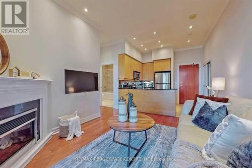 3108 - 4080 Living Arts Drive S, Mississauga, ON - Indoor Photo Showing Living Room With Fireplace