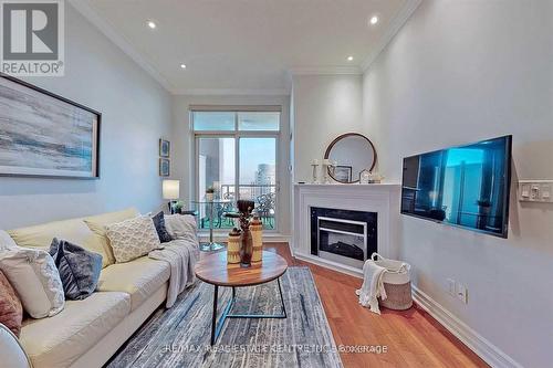 3108 - 4080 Living Arts Drive S, Mississauga, ON - Indoor Photo Showing Living Room With Fireplace