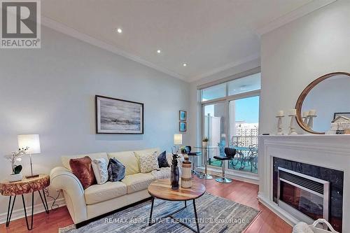 3108 - 4080 Living Arts Drive S, Mississauga, ON - Indoor Photo Showing Living Room With Fireplace