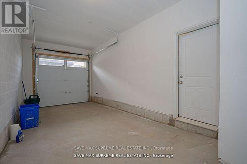 1556 Hilson Heights, Milton, ON - Indoor Photo Showing Garage