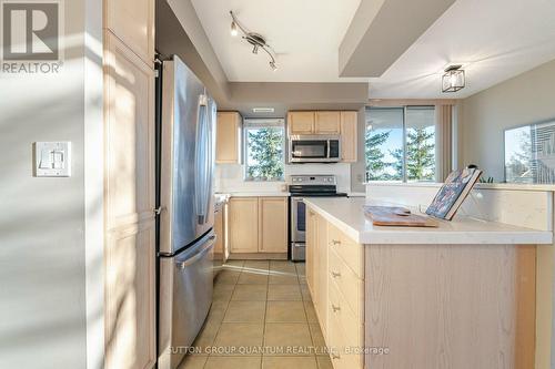 305 - 1140 Parkwest Place S, Mississauga, ON - Indoor Photo Showing Kitchen