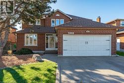 View of front of house featuring a garage - 