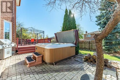 View of patio with a hot tub, a grill, and a deck - 2080 Sixth Line, Oakville, ON - Outdoor With Deck Patio Veranda