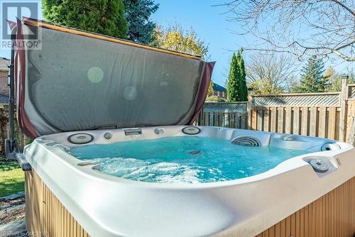 View of swimming pool with a hot tub - 2080 Sixth Line, Oakville, ON - Outdoor