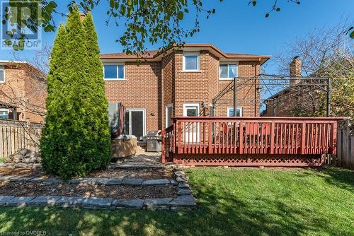 Back of property featuring a yard and a wooden deck - 2080 Sixth Line, Oakville, ON - Outdoor With Deck Patio Veranda