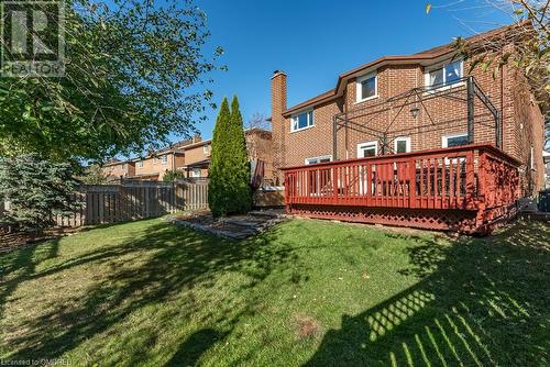 Back of property featuring a yard and a deck - 2080 Sixth Line, Oakville, ON - Outdoor With Deck Patio Veranda