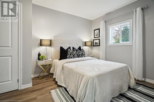 Bedroom with hardwood / wood-style floors - 59 Stanley Street, Brantford, ON - Indoor Photo Showing Bedroom