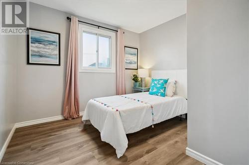 Bedroom featuring light wood-type flooring - 59 Stanley Street, Brantford, ON - Indoor Photo Showing Bedroom