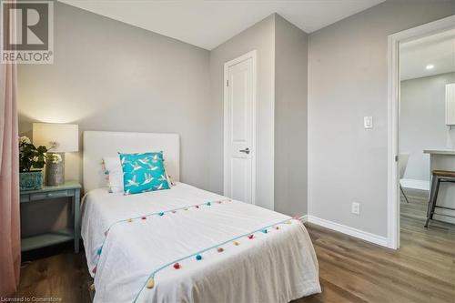 Bedroom with hardwood / wood-style flooring - 59 Stanley Street, Brantford, ON - Indoor Photo Showing Bedroom