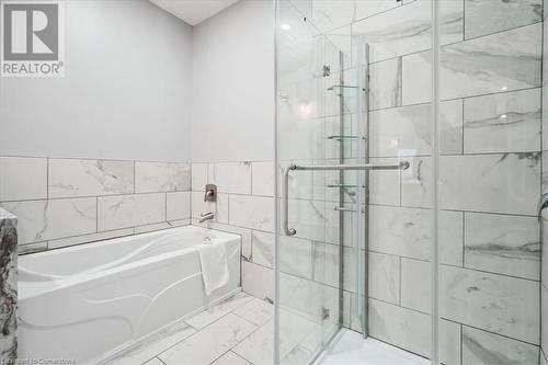 Bathroom with shower with separate bathtub and tile walls - 59 Stanley Street, Brantford, ON - Indoor Photo Showing Bathroom