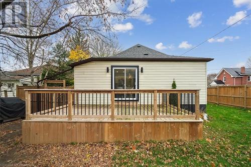 Rear view of property with a lawn and a wooden deck - 59 Stanley Street, Brantford, ON - Outdoor With Deck Patio Veranda With Exterior