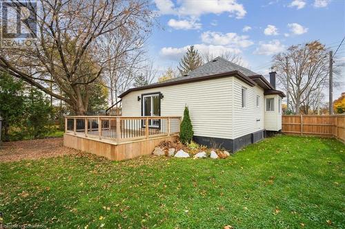 Rear view of property featuring a lawn and a deck - 59 Stanley Street, Brantford, ON - Outdoor With Deck Patio Veranda