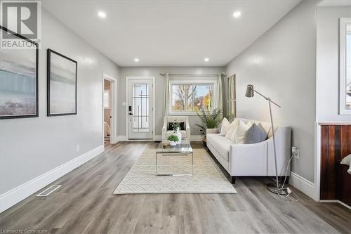 Unfurnished living room with light wood-type flooring - 59 Stanley Street, Brantford, ON - Indoor Photo Showing Living Room