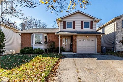 View of front of house featuring a garage - 56 Imperial Road N, Guelph, ON - Outdoor With Facade