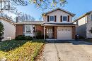 View of front of house featuring a garage - 56 Imperial Road N, Guelph, ON  - Outdoor With Facade 