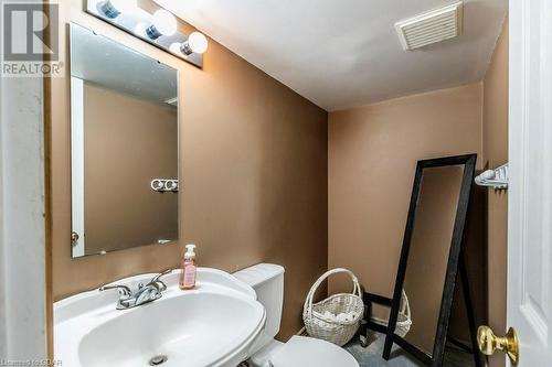 Bathroom with sink and toilet. Shower rough in - 56 Imperial Road N, Guelph, ON - Indoor Photo Showing Bathroom