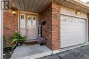 View of exterior entry featuring a garage - 56 Imperial Road N, Guelph, ON  - Outdoor With Exterior 