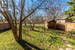 View of yard featuring a storage unit - 