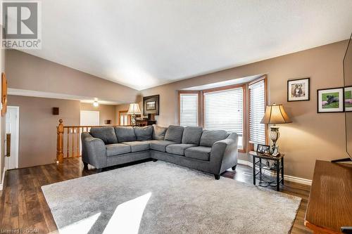 Living room with new flooring and vaulted ceiling - 56 Imperial Road N, Guelph, ON - Indoor Photo Showing Living Room