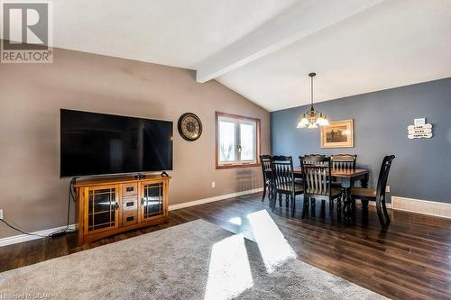 Dining space with new flooring, a chandelier, and lofted ceiling with beams - 56 Imperial Road N, Guelph, ON - Indoor