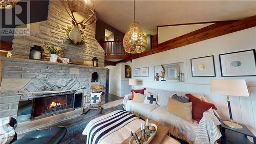 359 Ketchankookem Trail, Mindemoya, Manitoulin Island, ON - Indoor Photo Showing Living Room With Fireplace