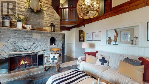 359 Ketchankookem Trail, Mindemoya, Manitoulin Island, ON - Indoor Photo Showing Living Room With Fireplace