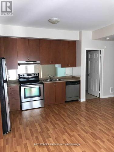 143 - 60 Fairwood Circle, Brampton, ON - Indoor Photo Showing Kitchen With Double Sink