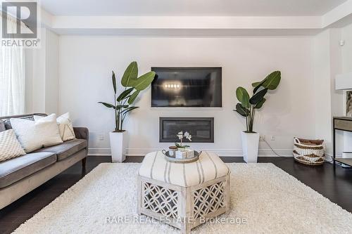 61 Ash Hill Avenue, Caledon, ON - Indoor Photo Showing Living Room With Fireplace