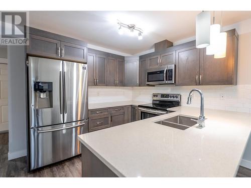 302 6798 Westgate Avenue, Prince George, BC - Indoor Photo Showing Kitchen With Double Sink With Upgraded Kitchen