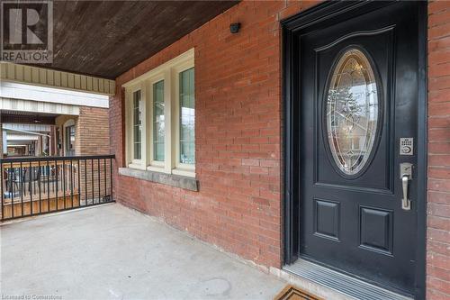 Doorway to property featuring covered porch - 262 Homewood Avenue, Hamilton, ON - Outdoor With Exterior