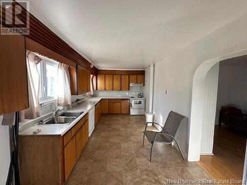 142 Notre-Dame Street, Atholville, NB - Indoor Photo Showing Kitchen With Double Sink