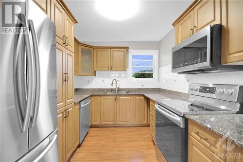 8 Henfield Avenue, Ottawa, ON - Indoor Photo Showing Kitchen With Stainless Steel Kitchen With Double Sink