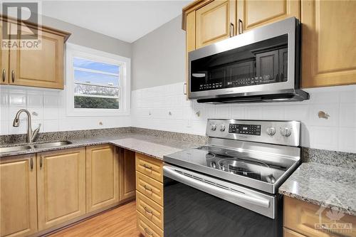 8 Henfield Avenue, Ottawa, ON - Indoor Photo Showing Kitchen With Double Sink