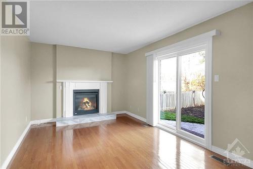 Family Room - 8 Henfield Avenue, Ottawa, ON - Indoor Photo Showing Living Room With Fireplace