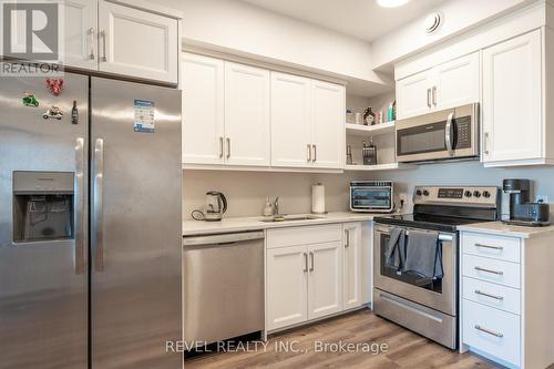 408 - 64 Main Street N, Haldimand, ON - Indoor Photo Showing Kitchen With Upgraded Kitchen