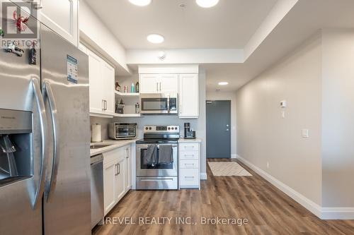 408 - 64 Main Street N, Haldimand, ON - Indoor Photo Showing Kitchen With Upgraded Kitchen