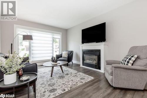 279 Anne Street N, Barrie, ON - Indoor Photo Showing Living Room With Fireplace