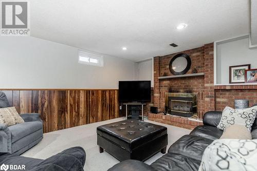 279 Anne Street N, Barrie, ON - Indoor Photo Showing Living Room With Fireplace