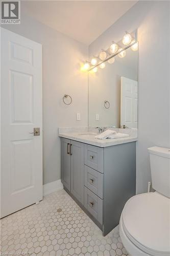 Bathroom featuring vanity and toilet - 2511 Lakeshore Road W Unit# 108, Oakville, ON - Indoor Photo Showing Bathroom